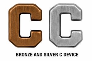 Bronze and Silver C Device: Bronze and silver C devices used on U.S. military ribbons and medals to denote combat conditions.
