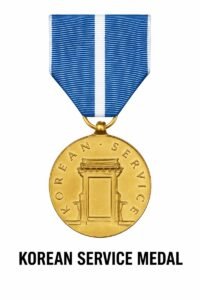 Korean Service Medal awarded to U.S. military personnel who served during the Korean War, featuring a blue-and-white ribbon and bronze medal.